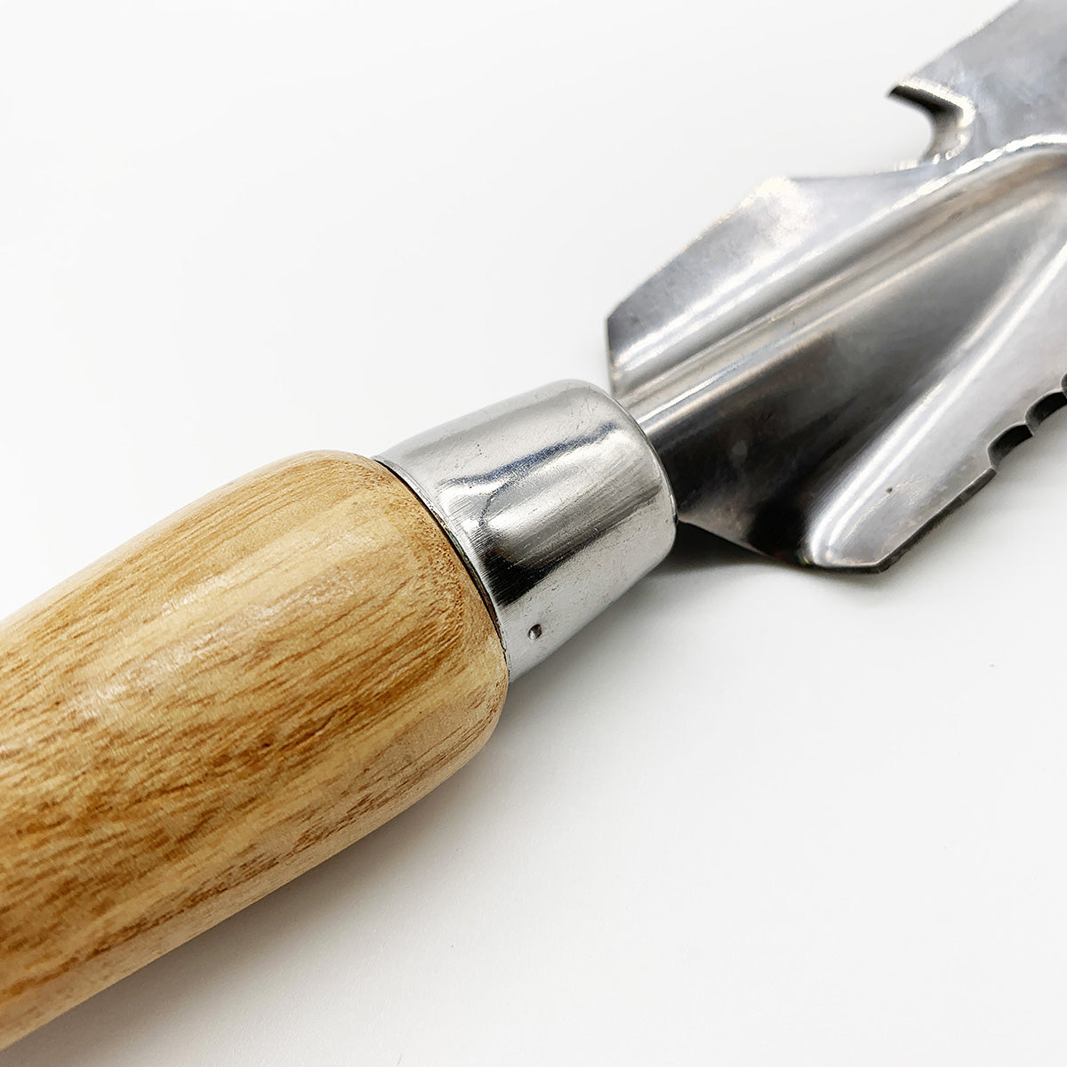 A 5-in-1 hand multi weeder with an ash wood handle, stainless steel serrated head, and a leather strap.